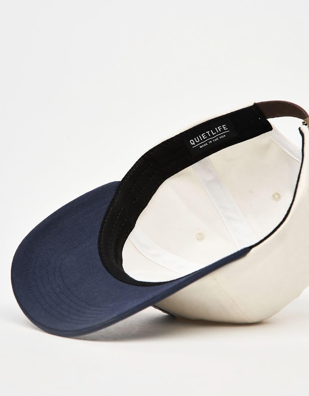 The Quiet Life Courbier Polo Cap - Stone/Navy