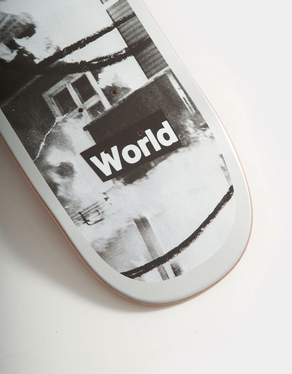 Poetic Collective Cuts Out World Skateboard Deck