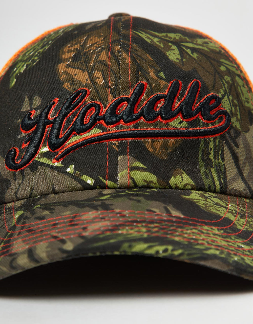 Hoddle Intarsia Script Trucker Cap - Forest Camo/Orange