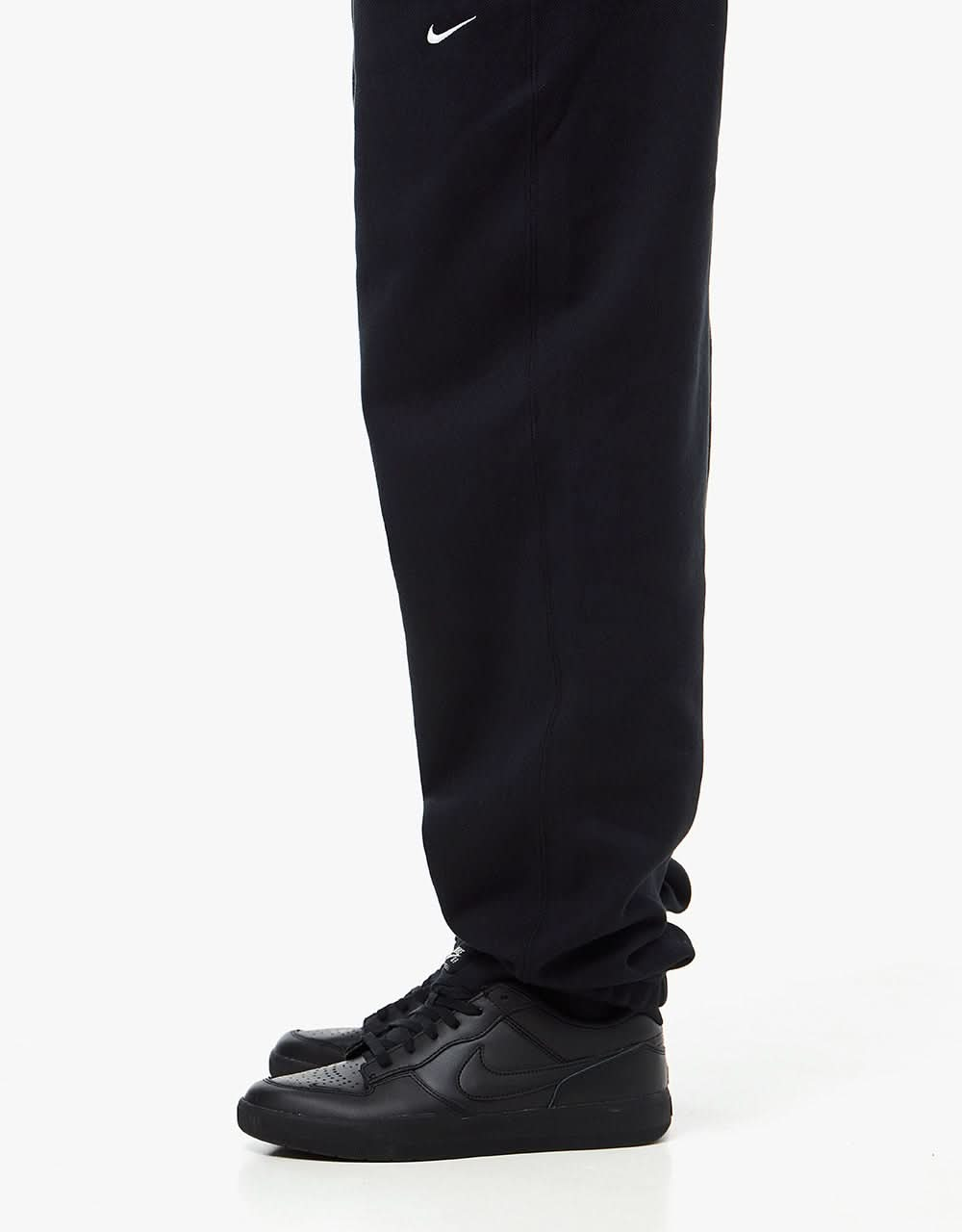 Pantalon de survêtement Nike Solo Swoosh - Noir/Blanc