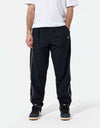 Nike SB Rugged Track Pant - Black/Summit White/Safety Orange