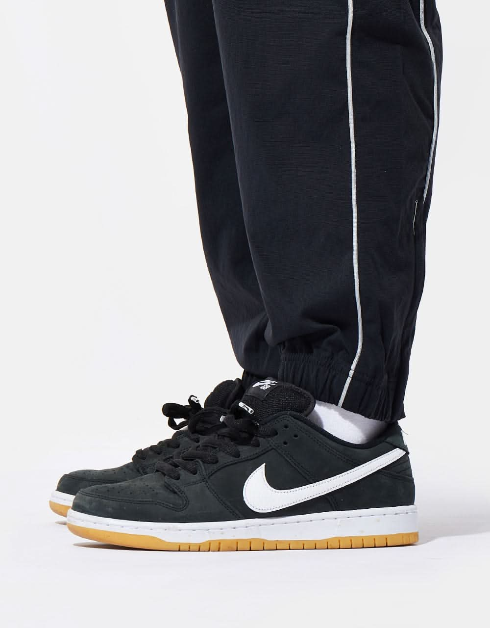 Nike SB Rugged Track Pant - Black/Summit White/Safety Orange